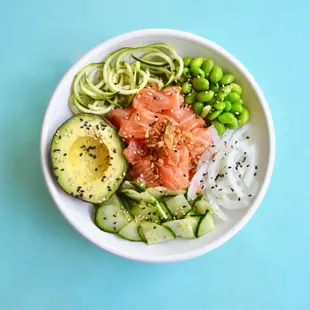 a bowl of food on a blue surface