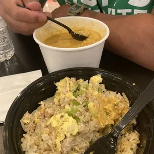 Yellow curry with chicken, potatoes,, and carrots.  And crab fried rice.