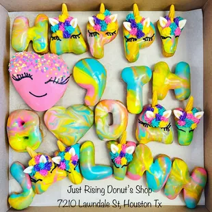 a box of decorated donuts