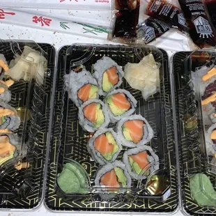 3 types of sushi. California avenue, Chinook n&apos;at, and firecracker tuna! (left to right)