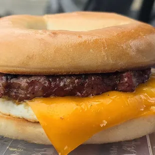 Pork sausage bagel sandwich