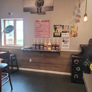 Wall of house made sauces