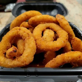 Fried onion rings that came with the sub combo. It costs 75 cents  extra if you don't want the fries.
