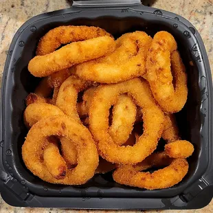 Fried onion rings that came with the sub combo. It costs 75 cents extra if you don't want fries.