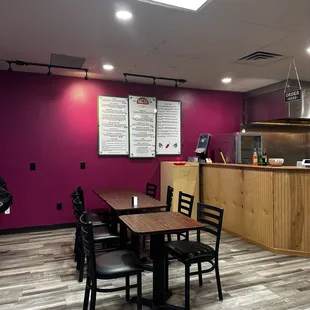 a table and chairs in a restaurant