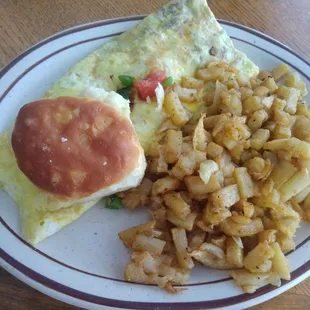 Veggie omelet (with cheese added), biscuit, and hash browns. Best hash browns I've had in awhile, seasoned quite well!