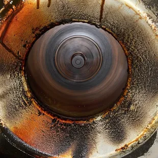 a close up of a rusted metal object
