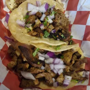 $1 tacos... carnitas and asada