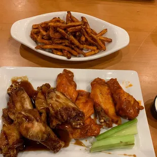 Sweet potato fries and half sesame wings half lemon pepper buffalo