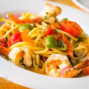 Bucatini with wild gulf prawns castelvetrano olives, capers, red onions, red bell peppers, cherry tomatoes, parsley, garlic, white wine &amp;btr