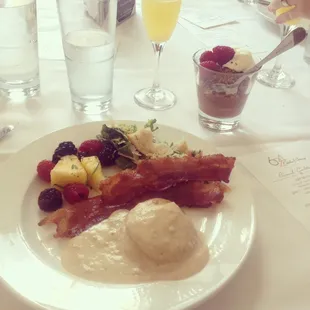 Biscuits and gravy. Bacon. Fresh fruit with mint. Caesar salad. And amazing chocolate mousse.