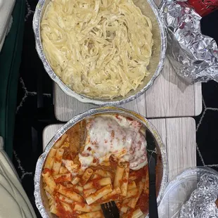 Fettuccine Alfredo and chicken parmagina with ziti