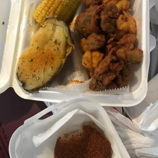 Frozen crab cake (tastes fresh)/fried shrimp and oysters/garlic potato and corn