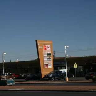 a large billboard in a parking lot