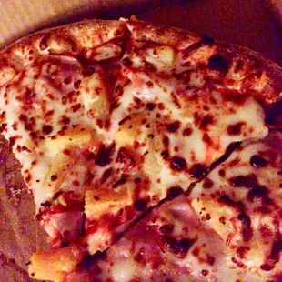 a sliced pizza in a box