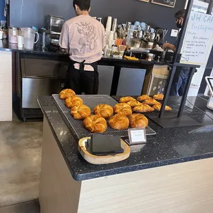 The ordering counter with fresh butter croissants