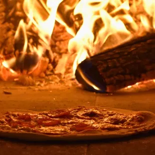 Our Mobile Pizza Oven Cooking a Pizza