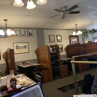 a man sitting at a table in a restaurant