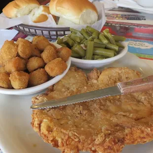 Chicken Fried Chicken (size of full length knife), okra, green beans, gravy on the side, dinner rolls