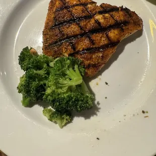 Salmon comes on a bed of rice with two sides but I get mine without rice.