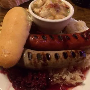 Bratwurst Platter. Did a poor job of the red cabbage flooding the sauerkraut. Brats were low quality; salty. Just bad = 1