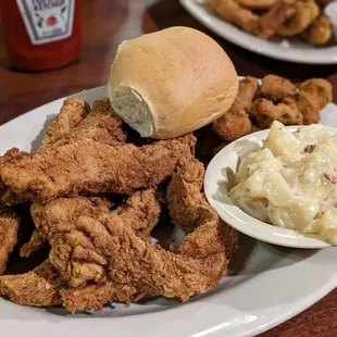 Chicken tender dinner plate with okra and baked potato casserole