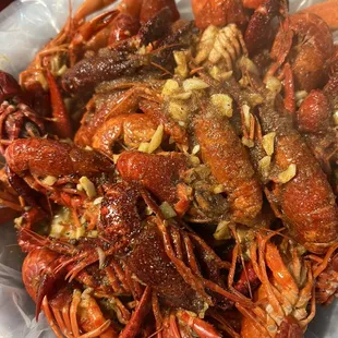 a pile of cooked lobsters