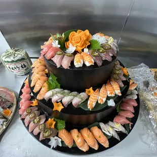 a tiered display of sushi