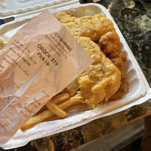 My receipt for wings and catfish but a plate of whiting {i think} &amp; shrimp