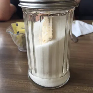 Nicely done! A saltine in the sugar dispenser to prevent clumping! Ingenious! ; )
