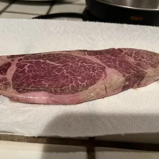 a piece of steak on a napkin