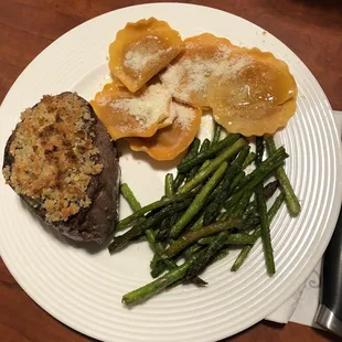 Parm crusted filet mignon, fresh butternut squash ravioli, and roasted asparagus.