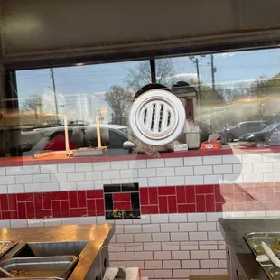 a view of a restaurant through the window