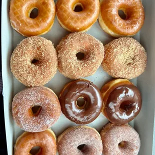 a variety of doughnuts in a box
