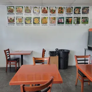 Menu of Thai food and interior dine-in tables