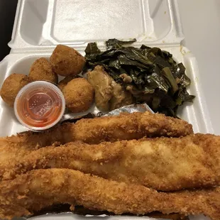 a tray of chicken nuggies and greens