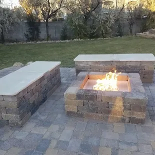 Patio, Bench, And Fireplace Made Out Of Pavers And Flagstone