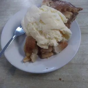 a piece of pie with ice cream
