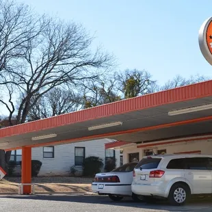 two cars parked in front