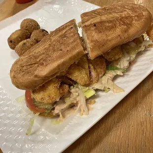 Shrimp po boy with hush puppies