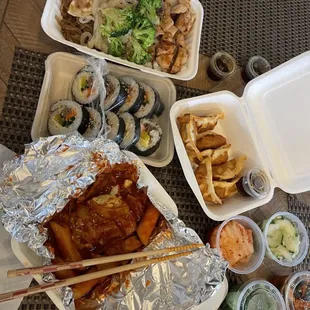 Kimbap, tteokbboki, banchan, yakimandu, chicken teriyaki bowl