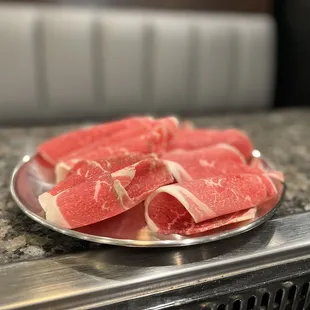 a plate of raw meat