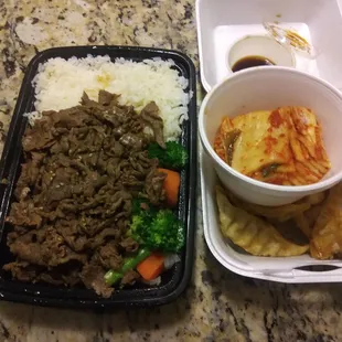 Bulgogi with pot stickers and kimchi