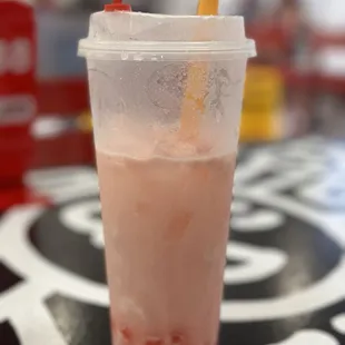 a drink in a plastic cup