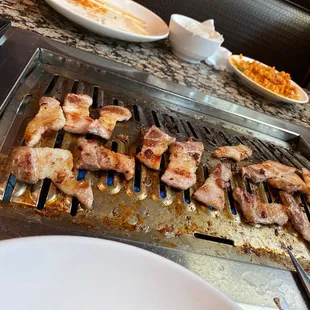 Wine pork belly, and regular pork belly.