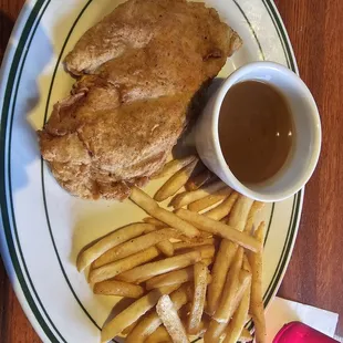 Supposed to be chicken fried chicken with brown gravy on it...not on the side.