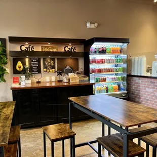 a coffee shop with tables and chairs