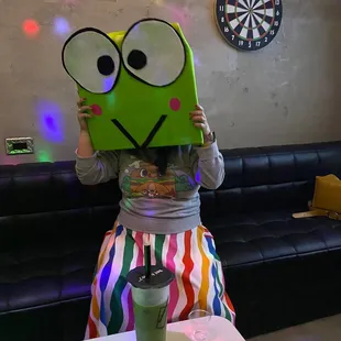 a woman with a green face