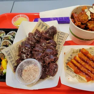 Kimbap, soon-dae, crispy spicy rice cake, sweet and spicy chicken bites with rice cakes