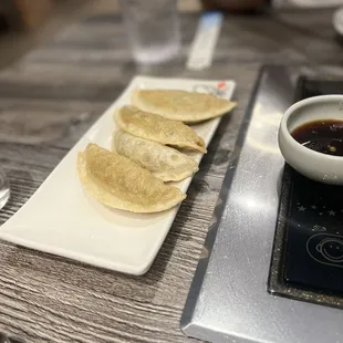 Pan seared dumplings (6 come in the order but we ate 2 before snapping the pic) oops